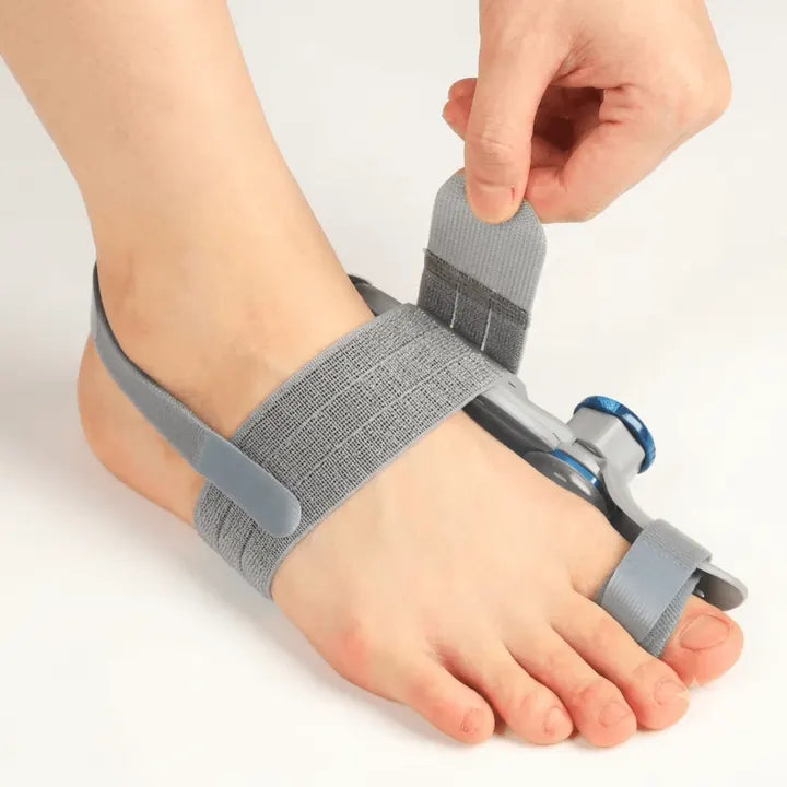 Secure the corrector on your big toe and foot
